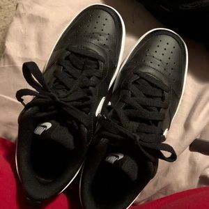 black and white Nike air force 1s